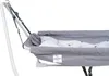 A close-up side view of a grey baby hammock with a white pillow with stars. Produktbild-Vorschau