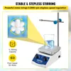 A magnetic stirrer with a beaker of liquid on top, with illustrative callouts highlighting its features. Voir les images du produit