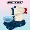 A toy airplane on a blue base with a blue bowl. Anteprima dell’immagine prodotto