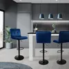 A modern kitchen or dining area with bar stools at a counter. Náhľad obrázku produktu