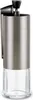 A manual coffee grinder with a glass base and a metal body. Podgląd zdjęcia produktu