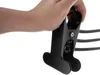 A hand is holding a black clamp with flexible tubes attached. Náhľad obrázku produktu