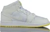 A studio shot of a single Nike Air Jordan 1 Mid shoe. Podgląd zdjęcia produktu