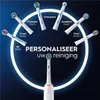 A marketing image showcasing various Oral-B electric toothbrush heads arranged around a central toothbrush handle, with text highlighting personalization. Produktbild-Vorschau