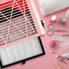 A pink nail dust collector with a filter is shown on a pink background, surrounded by various manicure tools and nail polish bottles. Anteprima dell’immagine prodotto