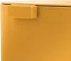A close-up view of the top corner of a yellow trash can, showing a part of the lid mechanism. Podgląd zdjęcia produktu