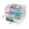 A clear, well-lit image of a multi-tiered plastic storage box filled with colorful clay or felt wool. Produktbild-Vorschau