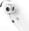 A white PowerCube Extended with a 1.5m grey cable is mounted on a white wall. Produktbild-Vorschau