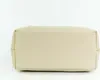 The bottom view of a beige handbag against a white background. Produktbild-Vorschau