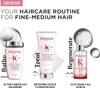 A marketing image showcasing a three-step haircare routine for fine-medium hair, featuring Kérastase Genesis products. Produktbild-Vorschau