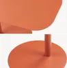 Close-up views of a round metal table base and a curved tabletop. Produktbild-Vorschau