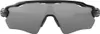 A front view of a pair of black Oakley sunglasses with gray lenses. Náhled obrázku produktu