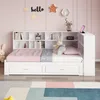 A child's bed with a bookshelf headboard, decorated with stars and the word "hello" on a pink wall. Produktbild-Vorschau