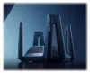 A futuristic-looking black router with multiple antennas against a dark blue background. Podgląd zdjęcia produktu