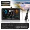 A weather station with a digital display showing time, temperature, and weather forecasts, placed in front of a scenic background of mountains and clouds. Produktbild-Vorschau
