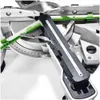 A close-up view of a miter saw's cutting head and angle adjustment mechanism. Podgląd zdjęcia produktu