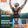 A muscular man is wearing a weighted vest outdoors with a mountainous landscape in the background. Anteprima dell’immagine prodotto