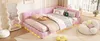 A pink corner daybed with ambient lighting and USB ports, decorated with pillows and blankets, in a bedroom setting with a wavy mirror and a fluffy chair. Podgląd zdjęcia produktu