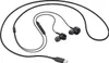 A pair of black wired USB-C headphones is shown against a white background. Voir les images du produit