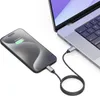 A smartphone is being charged by a laptop using a USB-C cable. Produktbild-Vorschau