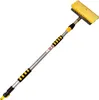 A telescopic car wash brush with a yellow brush head and a silver and black handle, shown against a white background. Náhľad obrázku produktu