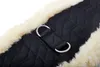 A close-up view of a horse girth with faux fur lining and metal rings. Produktbild-Vorschau