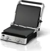 A product shot of an open electric grill. Podgląd zdjęcia produktu