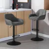Two gray bar stools are placed in front of a kitchen counter. Produktbild-Vorschau