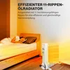 A person sleeping in a bed next to an oil radiator that is emitting heat. Náhled obrázku produktu