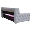 A modern upholstered bed frame with integrated storage and LED lighting. Náhled obrázku produktu