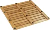 A close-up, angled view of a wooden bath mat with black non-slip feet. Produktbild-Vorschau