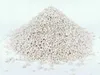 A pile of perlite on a white background. Voir les images du produit