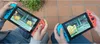 Nintendo Switch, Farbe: Neon-Rot/Neon-Blau, Speicher: 32 GB Produktbild-Vorschau 17