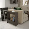 A modern living room scene with a sofa, a side table, and decorative frames. Produktbild-Vorschau