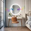 A modern bedroom or dressing area with a vanity, mirror, and bed. Anteprima dell’immagine prodotto