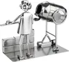 A metal sculpture of a construction worker with a cement mixer and bricks. Náhľad obrázku produktu