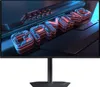 A gaming monitor displaying the word "GAMING" in large, stylized 3D letters with neon accents. Anteprima dell’immagine prodotto