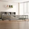 A child's bedroom with a bed and shelves. Produktbild-Vorschau