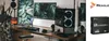 A desk setup with multiple monitors, a computer, and a video capture card. Náhled obrázku produktu