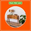 A vintage-style wooden cabinet with a lamp and a plant in a circular frame, set against an orange background. Produktbild-Vorschau