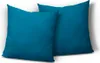 Two teal pillow covers are shown against a white background. Produktbild-Vorschau