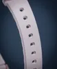 A close-up shot of a pink watch strap with holes for adjustment. Produktbild-Vorschau