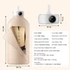 A collage showing a portable clothes dryer and its specifications. The main image is of the dryer with a garment inside. A smaller image shows the top unit with controls, and text lists the product's specifications. Voir les images du produit