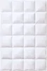A white down comforter is shown flat against a white background, with a grid pattern of stitching. Náhled obrázku produktu