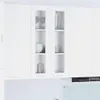 A close-up view of a white kitchen cabinet with glass doors. Anteprima dell’immagine prodotto