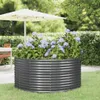 A raised garden bed filled with purple hydrangeas sits on a lawn next to a patio umbrella and table. Náhľad obrázku produktu
