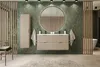 A modern bathroom with a double vanity, large round mirror, and green tiled walls. Anteprima dell’immagine prodotto