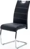 A black faux leather dining chair with a chrome cantilever base, shown from a three-quarter front angle against a white background. Podgląd zdjęcia produktu