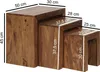 A set of three nesting tables with dimensions indicated by text overlays. Voir les images du produit