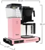 A pink Moccacoffee machine with dimensions indicated by measurement lines. Náhľad obrázku produktu